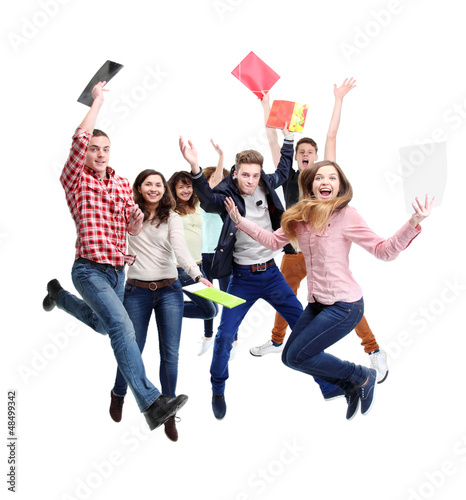 Photo: Group of happy young people jumping - isolated over a white Group of happy young people jumping - isolated over a white