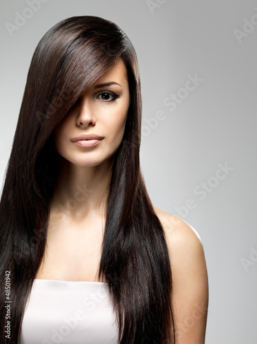 Photo: Beautiful woman with long straight hair Beautiful woman with long straight hair