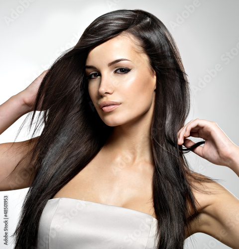 Photo: Fashion model with long straight hair. Fashion model with long straight hair.