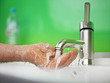 catching fresh water with hand