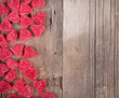 heart shape candy on wooden plank