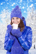 Photo: Winter girl drinking warm beverage. Winter girl drinking warm beverage.