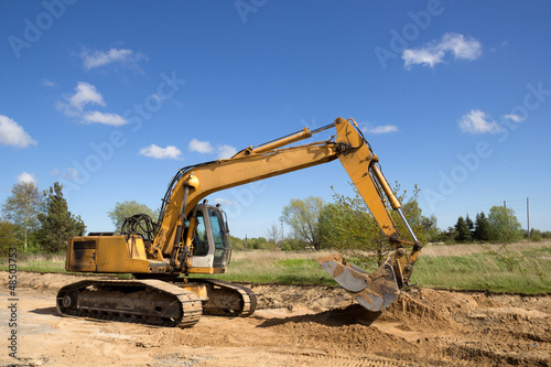 Photo: excavator working excavator working