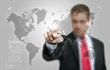 Businessman looking at a digital world map
