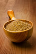 Cane sugar in a wooden spoon