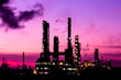 silhouette oil refinery plant and smoke at twilight morning
