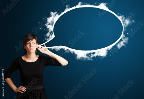 Photo: Young woman with abstract modern speech bubble Young woman with abstract modern speech bubble