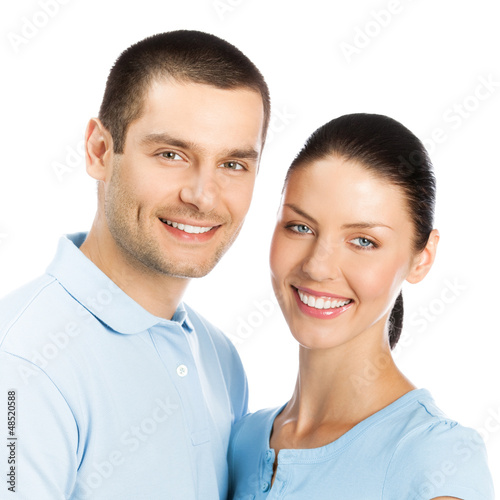 Photo: Happy smiling young couple, on white Happy smiling young couple, on white
