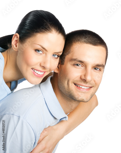 Photo: Happy smiling young couple, on white Happy smiling young couple, on white