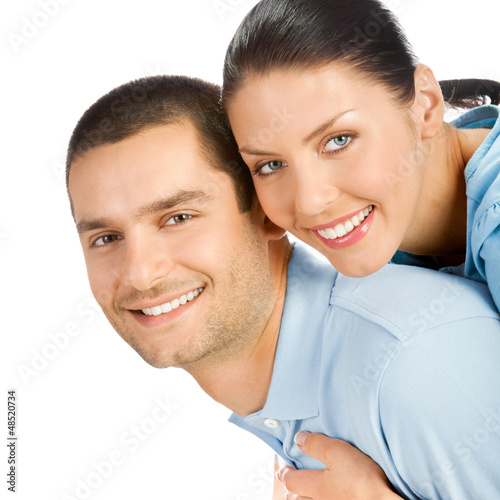 Photo: Happy smiling young couple, on white Happy smiling young couple, on white