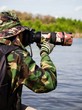 Photographer taking photo in wild