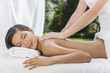 Woman Relaxing At Health Spa Having Massage