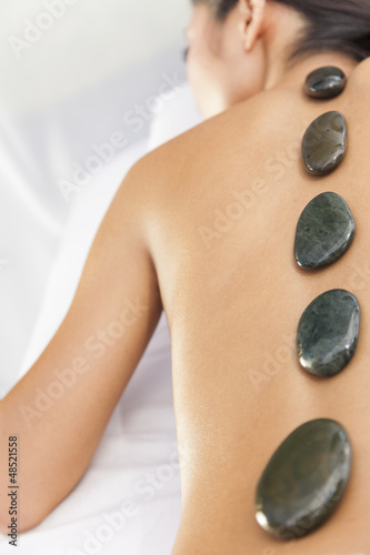 Photo: Woman Relaxing Health Spa Hot Stone Treatment Massage Woman Relaxing Health Spa Hot Stone Treatment Massage