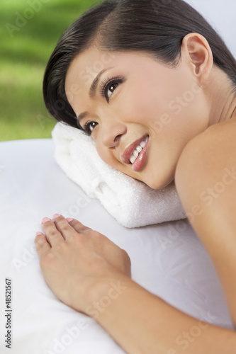 Photo: Woman Relaxing At Health Spa Having Massage Woman Relaxing At Health Spa Having Massage