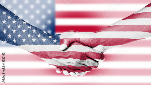Photo: Man and woman shaking hands Man and woman shaking hands