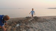 Video: Boy having fun on the beach Boy having fun on the beach