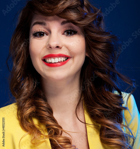 Photo: Expressive portrait of a beautiful happy young woman Expressive portrait of a beautiful happy young woman