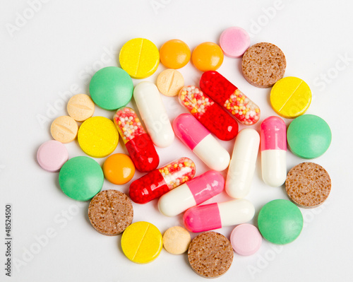 Photo: Close up colorful pills Close up colorful pills