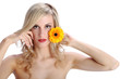 beautiful blond girl with gerber daisy flower on a white backgro