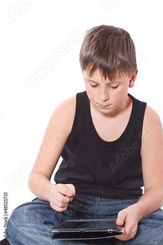Photo: boy with a Tablet PC boy with a Tablet PC