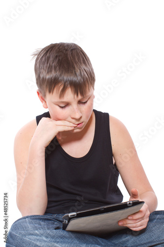 Photo: boy with a Tablet PC boy with a Tablet PC