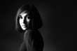 Photo: Black and white portrait of beautiful woman with bob hairstyle Black and white portrait of beautiful woman with bob hairstyle