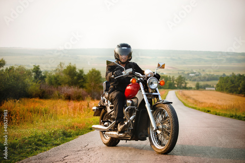 Photo: Biker on the country road Biker on the country road