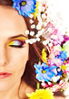 Photo: Face of woman with flower. Face of woman with flower.