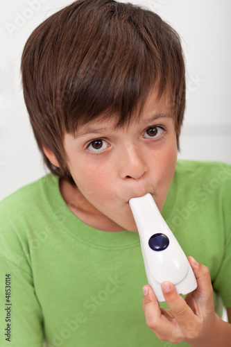 Photo: Boy with inhaler Boy with inhaler