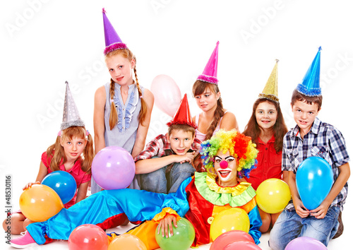 Photo: Birthday party group of teen with clown. Birthday party group of teen with clown.