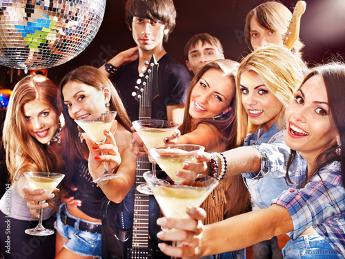 Photo: Woman on disco in night club. Woman on disco in night club.