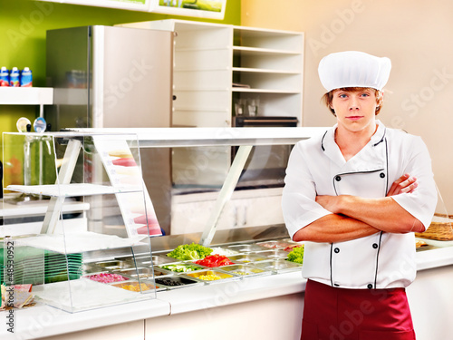 Photo: Male wearing chef uniform. Male wearing chef uniform.