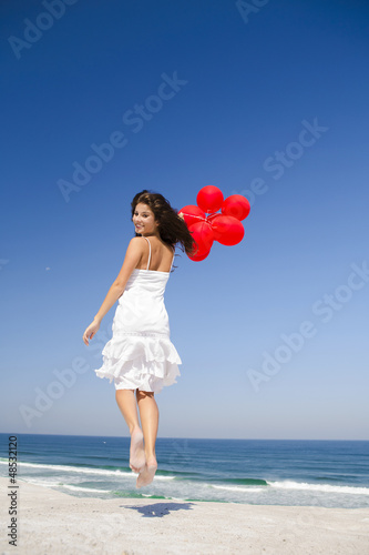 Photo: Jumping with red ballons Jumping with red ballons