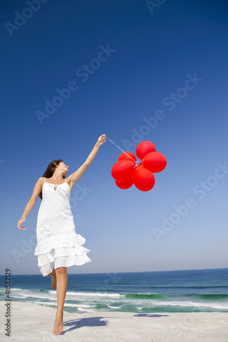 Photo: Jumping with red ballons Jumping with red ballons