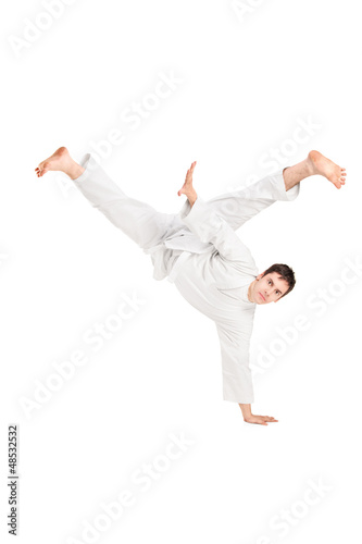 Photo: A young karate man performing A young karate man performing