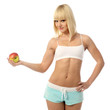Athletic girl offering an apple