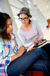 Student girls using smartphone at school