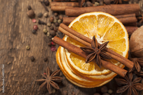 Photo: Different kinds of spices and dried oranges Different kinds of spices and dried oranges