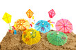 Colorful parasols and kites at the beach