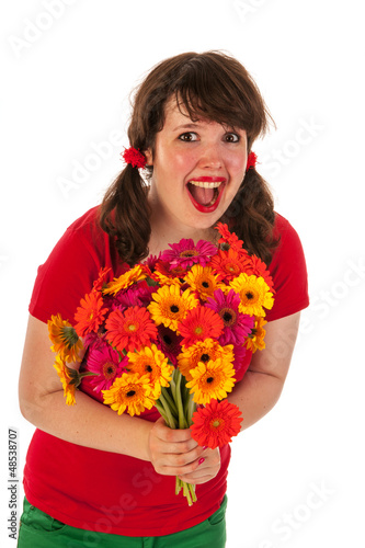 Photo: Young girl happy with flowers Young girl happy with flowers