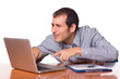Photo: Young Man Working with Computer Young Man Working with Computer