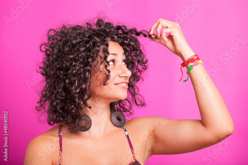Photo: Woman with Curly Hair Woman with Curly Hair