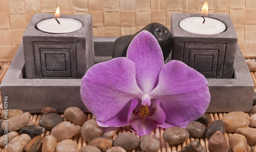 Photo: Candles, stones and orchid Candles, stones and orchid