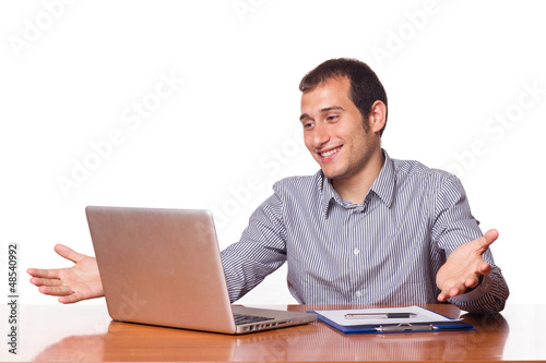 Photo: Young Man Working with Computer Young Man Working with Computer