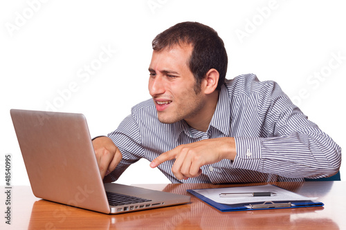 Photo: Young Man Working with Computer Young Man Working with Computer