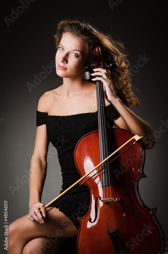 Photo: Woman performer with cello in studio Woman performer with cello in studio