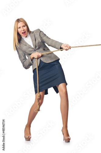 Photo: Businesswoman in tug of war concept Businesswoman in tug of war concept