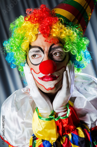 Photo: Funny clown in studio shooting Funny clown in studio shooting