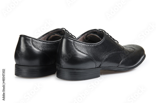 Photo: Fashion concept with male shoes on white Fashion concept with male shoes on white