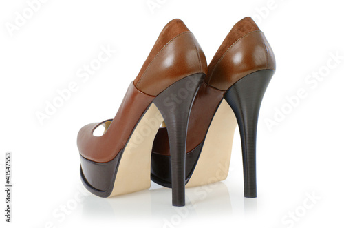 Photo: Woman shoes isolated on white Woman shoes isolated on white